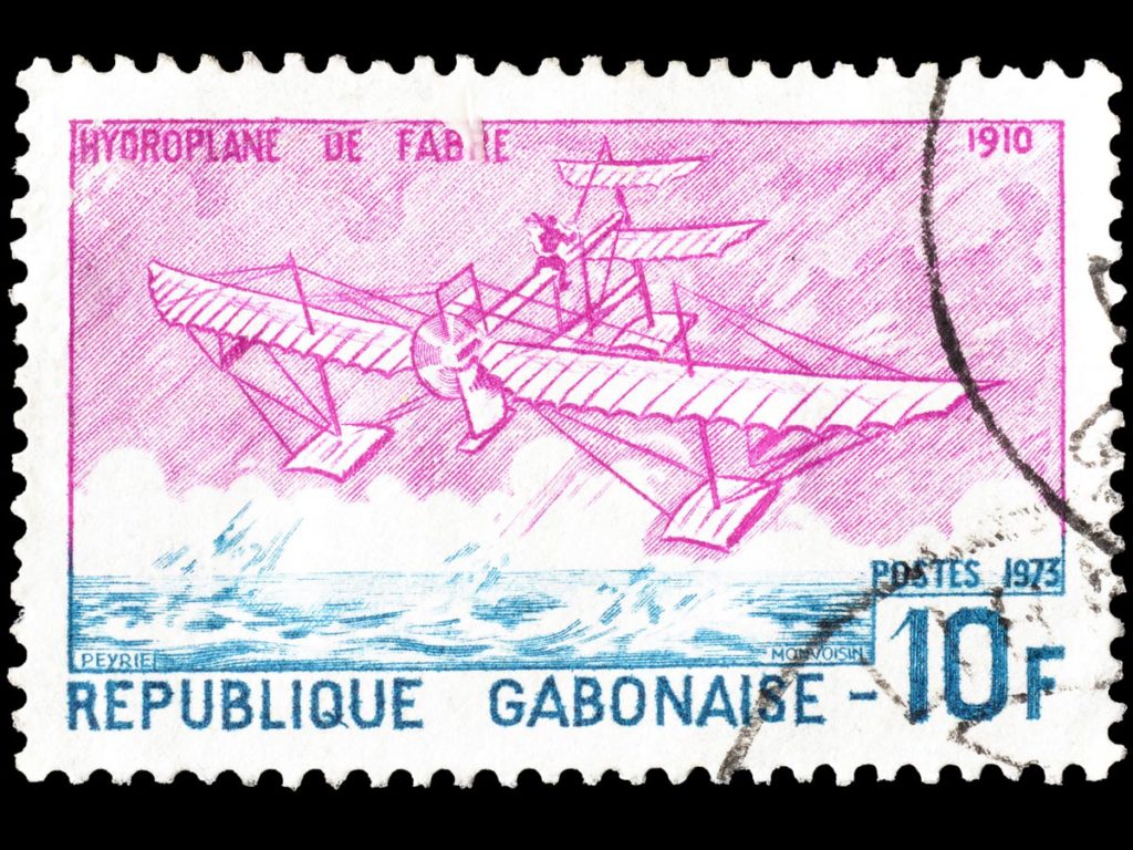 Gabon stamps: Pink and blue airplane issue.