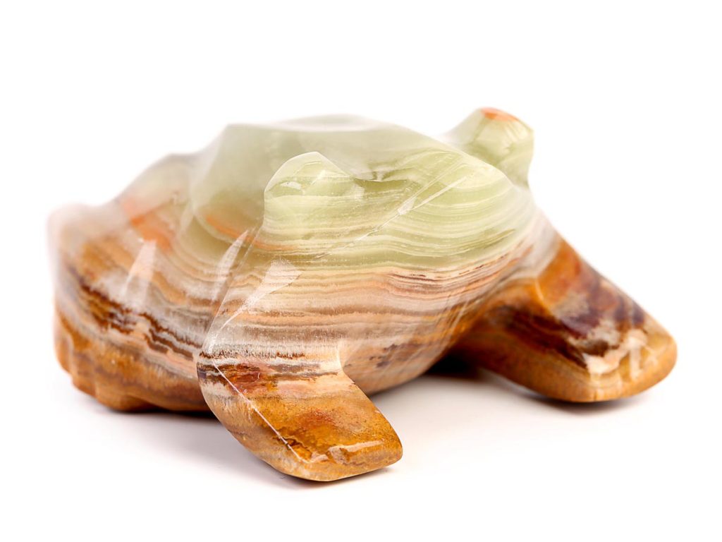 A turtle figurine made of gorgeous orange and brown jade.