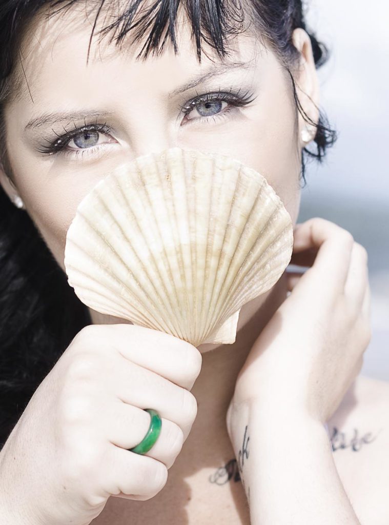 Jade gemstone ring on a woman's hand